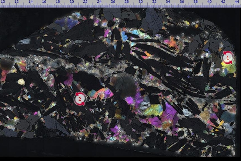 Microscope image of tin ore under crossed polars