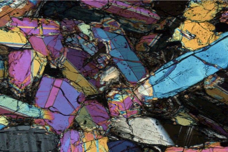 Photomicrograph under crossed polars of crystalline rock